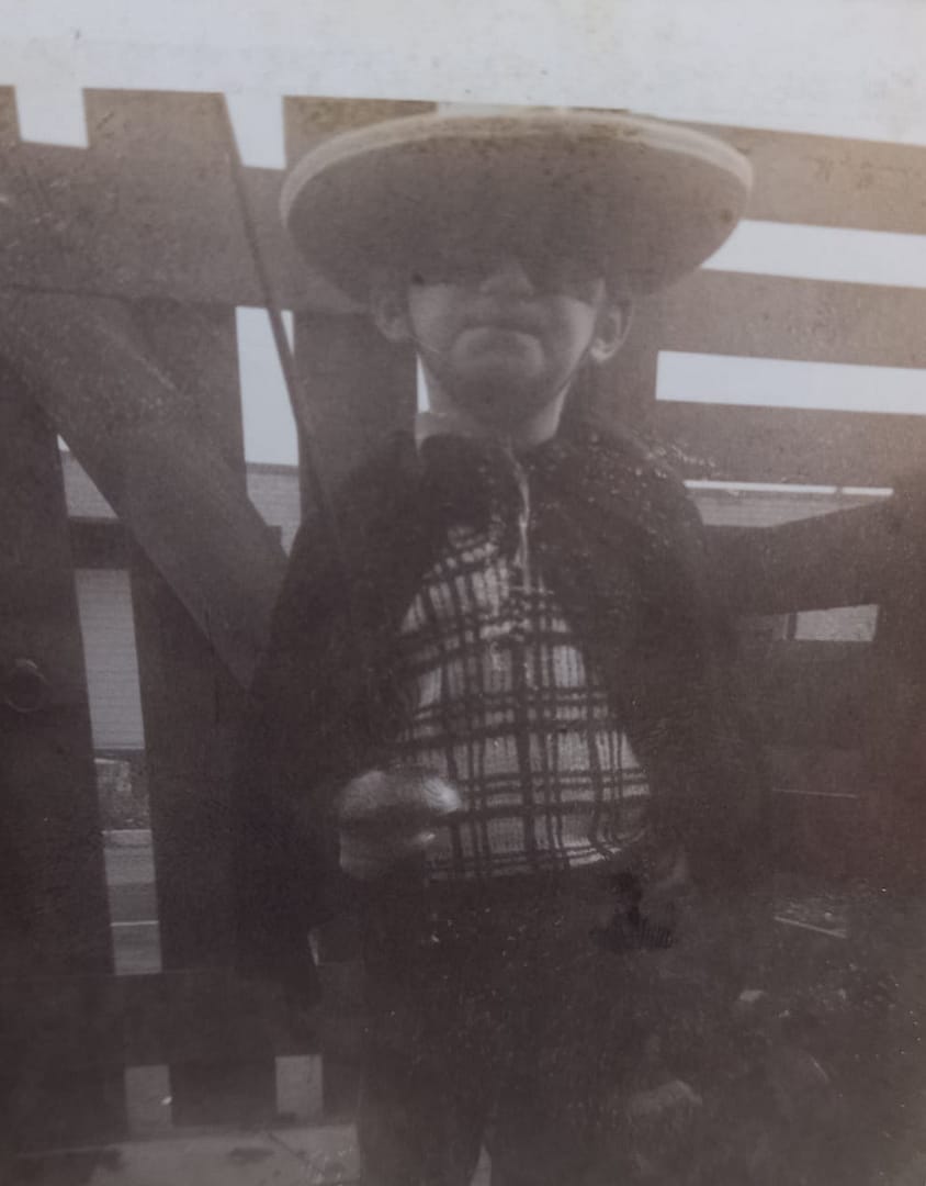 Mark as a child dressed as zorro