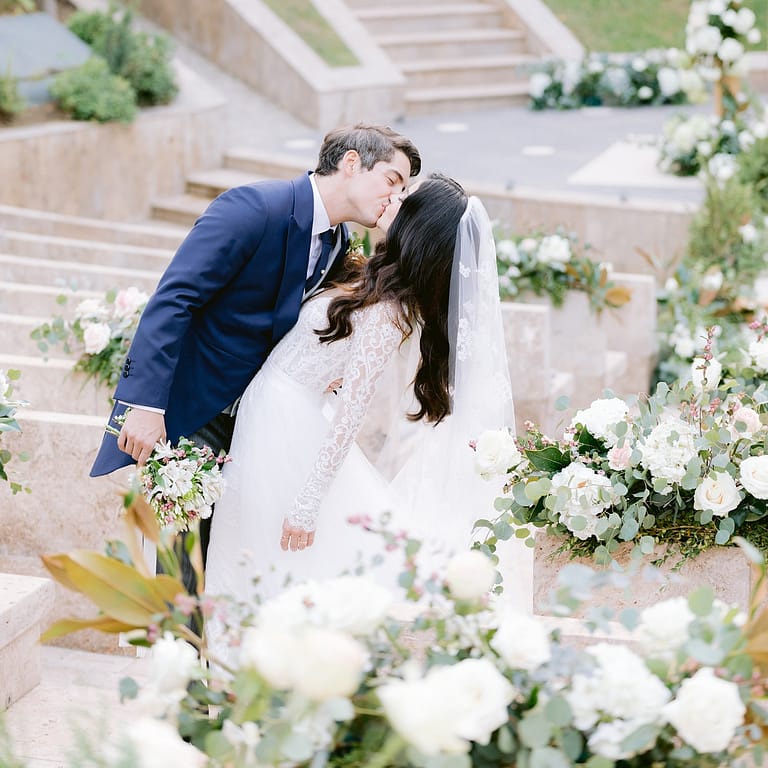 first kiss bride and groom wedding photographer unforgettable moments